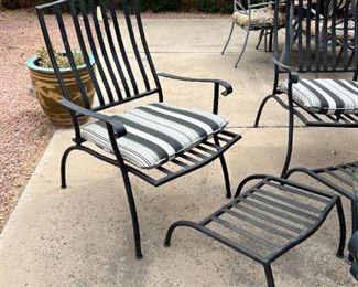Outdoor wrought iron chairs with foot rests and wrought iron circular table	Table 22” x 24” in diameter chairs 36” x 25” seating height 19 inches	
