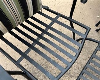 Outdoor wrought iron chairs with foot rests and wrought iron circular table	Table 22” x 24” in diameter chairs 36” x 25” seating height 19 inches	
