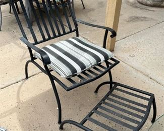 Outdoor wrought iron chairs with foot rests and wrought iron circular table	Table 22” x 24” in diameter chairs 36” x 25” seating height 19 inches	
