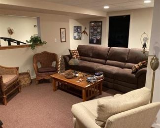 Double recliner sofa, mission style coffee table, wicker chairs