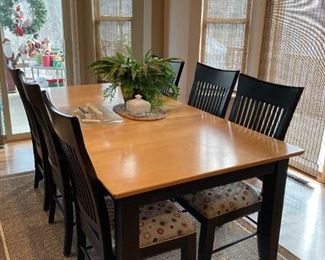Dining room table with leaf. Six chairs (2 captain chairs)