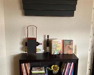 Shelf with baskets and vintage cookbooks