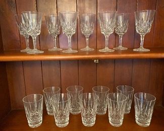 Top shelf 8 Gorham “King Edward” wine glasses 6"H Bottom shelf Waterford 12 (3 pictured in next photo) 8oz. flat tumbler 4-7/8"H