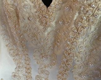 lace and seed pearl detail on bodice.
