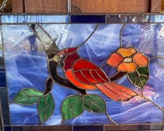 one of several window hanging stained glass panels.