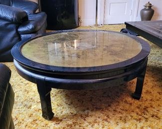 Black lacquer and gold swirl round coffee table