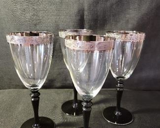 Silver embossed edge with black base glassware