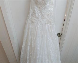 Beautiful white strapless wedding gown by David Bridal