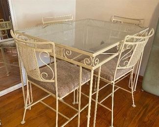 Wrought Iron table. Excellent condition.
Kept inside