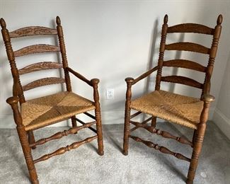 2 rush seat ladder-back arm chairs 