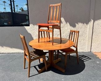 Danish modern teak table and 4 chairs. Lot #3242