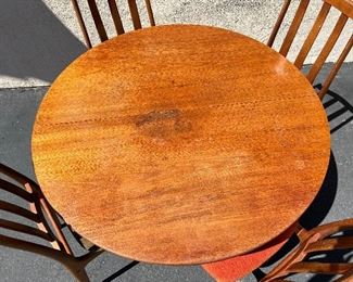 Danish modern teak table and 4 chairs. Lot #3242