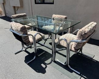 Renato Zevi  dining table and 4 Jerry Johnson chairs. Lot #3789