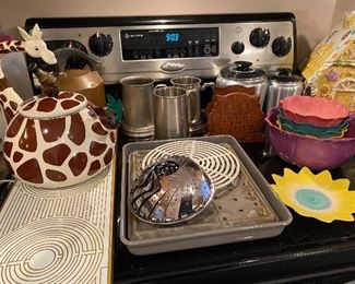Vintage Hot Plate, Unique Giraffe Teapot, Pewter steins (monogramed), Vintage Canisters (2), Gingerbread house Cookie Jar, Flower Motif Dishes