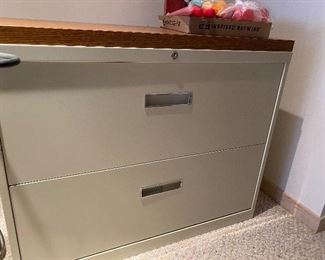 Two drawer wide filing cabinet with wood grain top