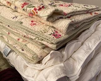 A Variety of like-new linens and blankets