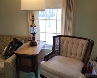 $45 ea  (2) Heritage side table. $40 ea (2) Stiffel brass and crystal lamps. $75 White/Cane arm chair,