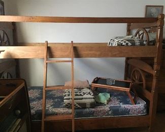 Wagon wheel bunk beds. Perfect for your cowboys and cowgirls. 