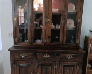 Vintage solid wood lighted China Cabinet.