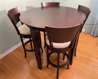 6_____ $275 
glass  • 54D
High top round table  • 40Hx44D & 4 swivel stools  • 43H and  • 30H at the seat level  • 17R