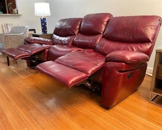 25_____ $395 
Leather sofa deep red / burgundy 2 manual recliners  • 40Tx 88Wx  22D 