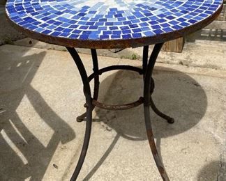 56_____ $50 
Round blue mosaic top table  • 28Tx24D