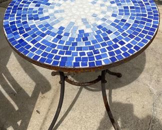 56_____ $50 
Round blue mosaic top table  • 28Tx24D