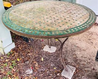 58_____ $50 
Large mosaic round table  • 32x42D