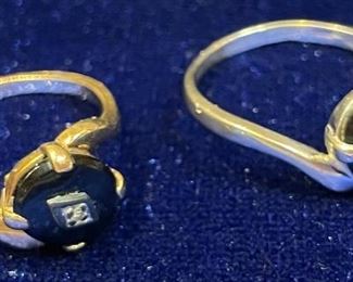 7_____ $50 
10kt gold ring with onyx 2 of them (0.07 oz) sz 4.5