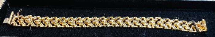 9_____ $400 
14kt yellow gold link bracelet Italy Milor 8inches 0.48oz