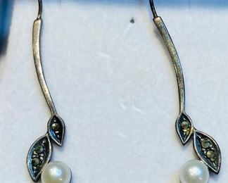 28_____ $36 
Pair of sterling earrings with 2 pearls
