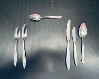 20_____$975 Gorham Firelight 8 place setting
Gorham fire light 
Total sterling weight 1771g / 62.469 oz
8 Salad fork 43g
8 Dining fork 56g
11 Teaspoon 34g 
8 Tablespoon 48g
1 Dual prong meat fork 61g
1 Serving spoon 68g
1 Small ladle ladle 62g 
1 Sugar spoon 30g
8 Bread knife -stainless blade
8 Table knife -stainless blade
