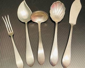 21_____$395 Reed & Barton Pointed Antique
Total sterling weight: 715g / 25.220oz
3 butter knives  Solid handle 31g 
6 dinner fork 41g
8 spoons 26g 
1 prong order fork pickle fork 18g
1 pointed spoon 36g
1 small ladle 30g 
1 sugar spoon 38g 
1 spreading knife 48g — solid handle
6 table knives  -Sterling handle mirror steel blade
1 Pie server Sterling handle/mirror steel blade  cake server -Sterling handle/ mirror steel blade
6 table knives  -Sterling handle mirror steel blade 
