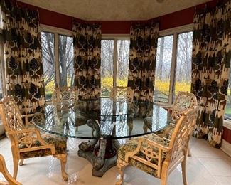 Glass top table with lazy Susan 
Chairs sold separately 