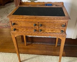 Early Oak writing desk with leather top
