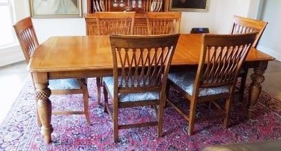 Tommy Bahama Pineapple Twist Table  and 8 chairs made by Lexington Furniture.  Seats 4-8 guests.  Measures: 76″W x 45.5″D x 30.5″H. Extends to 120.25" with two 22″ leaves.  The chairs have been re-upholstered with a blue and white paisley fabric. Minor scratches and marks as it's been used to serve family meals.  $2500