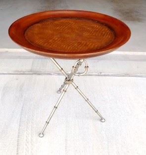 Serving Tray End Table - Top looks like a serving tray with faux alligator skin on top.  Made in the Phillipines.  Features 3 handles and metal legs with a bamboo look.  The top is not removable.  Normal wear and tear.  22" round and 25" tall.  $40