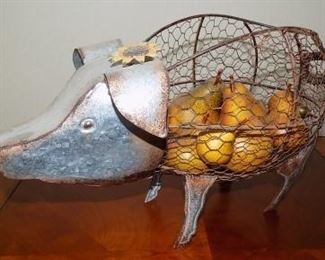 Metal Piggy with a Bellyful of Pears - Cute kitchen decor of a metal pig with a wire mesh body filled with plastic pears.  Complete with a curly tail and a sunflower on her head.  16"L x 10"H.   $35