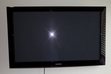 2009 Samsung 42" Plasma Flat Screen TV  w/Remote - Samsung No base.  It's been hung on a wall.  Does not include mounting bracket.  M odelPN42B450B1DXZA.  720p resolution.  Includes the remote.  Works great with a good picture!  No issues.   $150
