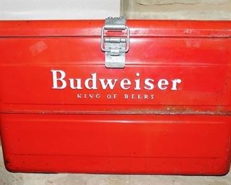 1950's Metal Budweiser "King of Beers" Ice Chest - Kind of a rare find here!  It's in excellent condition for its age.  Outside paint has some fade to it, but the inside is clean as a whistle.  Includes the original pull out tray AND bottle opener!  Typically these do not come with the extra pieces still in them.  Made of galvanized steel in side AND it still has the cap for the water drain!  A beautiful piece of nostalgia for sure!  There is some outer rust in the creases but overall this is great shape! $300