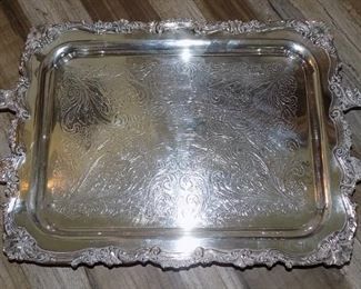 Heavy-Duty Sheridan SilverPlate Footed Butler Serving Tray - Measures 17.5"L x 13-1/4"W.  23" with handles.  Some pitting and scratches from use.  Weighs 6 pounds.  $75