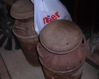 SEVERAL MILK CANS