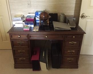 Beautiful leather topped desk with brass hardware. By Sligh Furniture. 