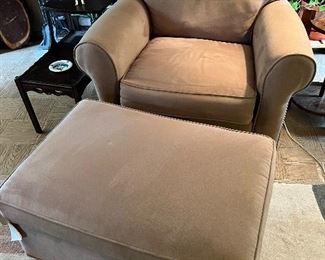 Upholstered armchair with matching ottoman