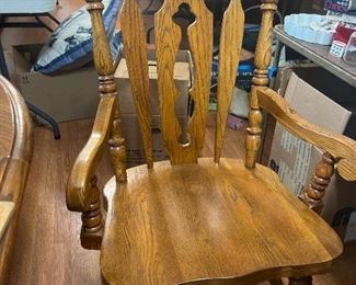 6 dining room table chairs, 2 with arms, 4 without. Comes with matching dining room table and china cabinet. 