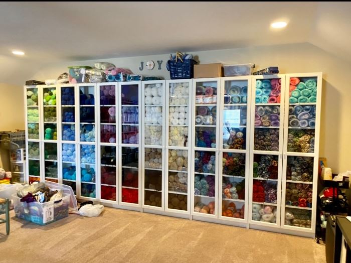 Over 1,000 brand new rolls of yarn starting at $2.50 (yarn will not go half price)  White Cabinets are not for sale 
