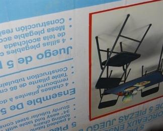 FOLDING TABLE WITH 4 CHAIRS - SOLD AS A SET