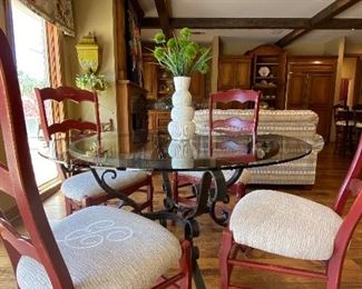52" round glass top table with heavy iron base. Ladderback chairs - "B" monogrammed on chair seat