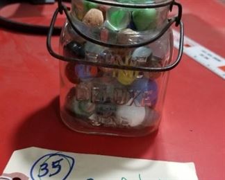 antique Pine Deluxe fruit jar full of old marbles