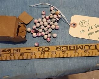 old pee wee china marbles with the original box.  These were made in Germany. 